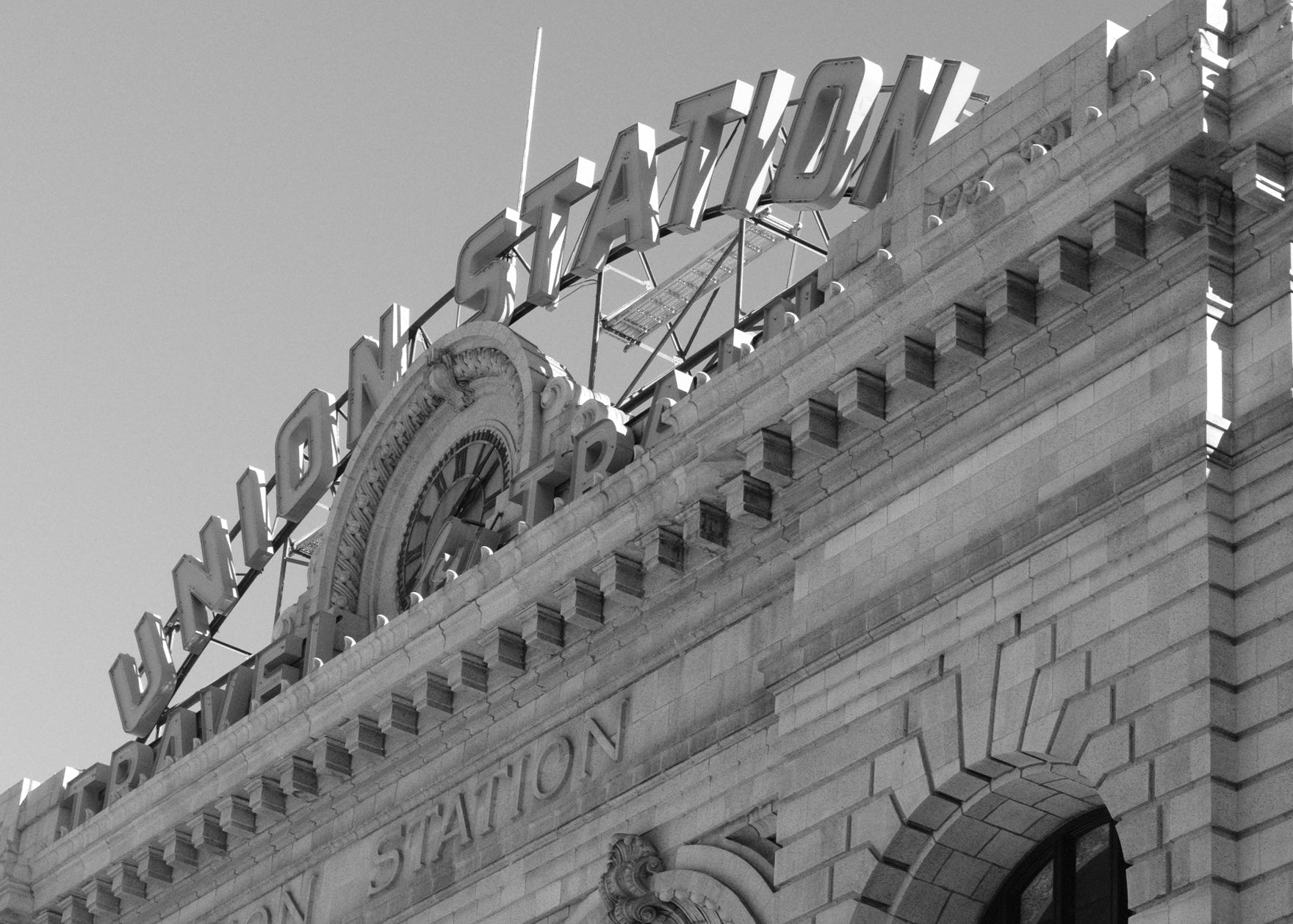 Close-up of an ornate building corner with intricate details.